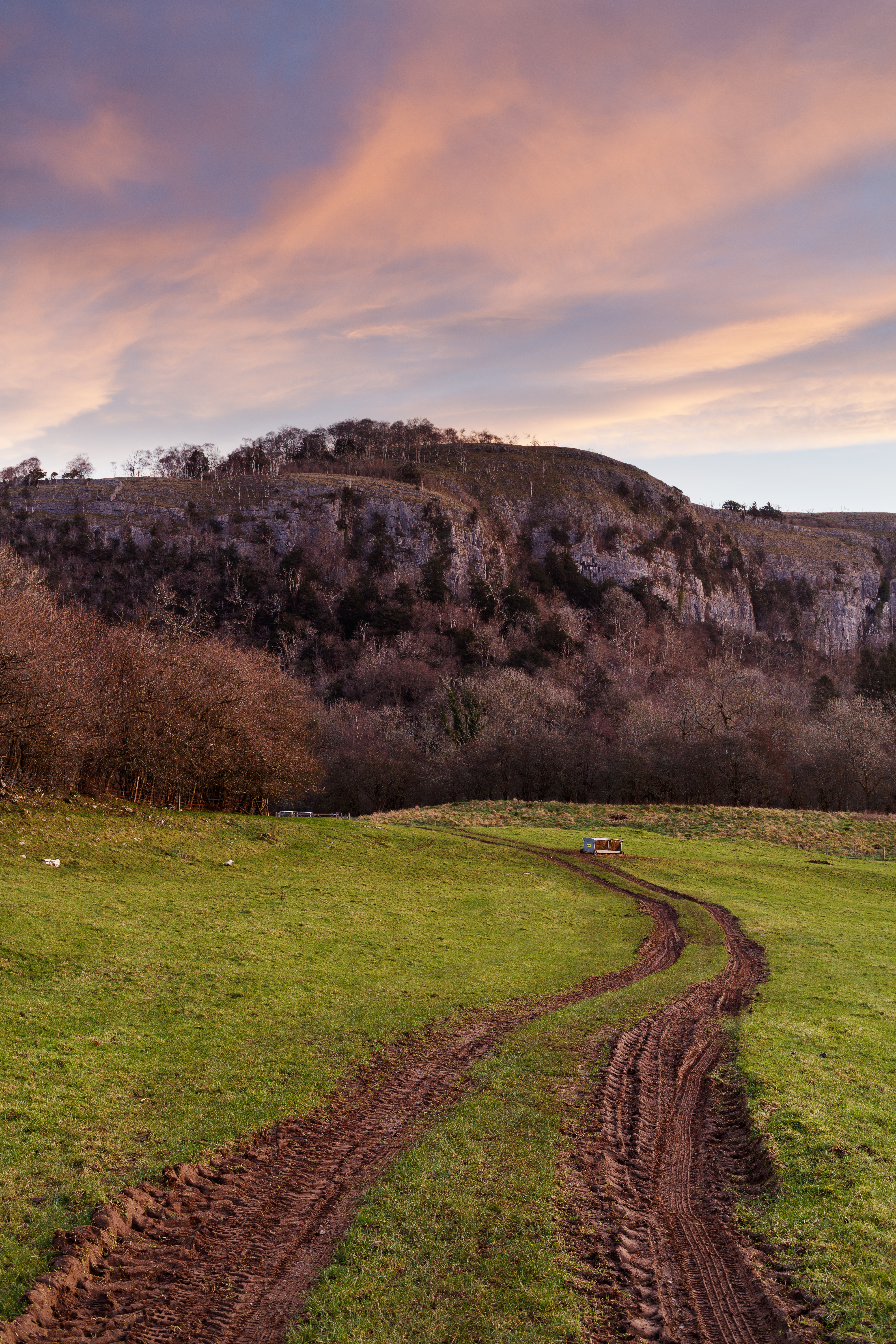 Shapely clouds pick up the colour of the winter dawn light above Chapel Head Scar's limestone face. A lovely sight to behold on a cold Christmas Eve morning!